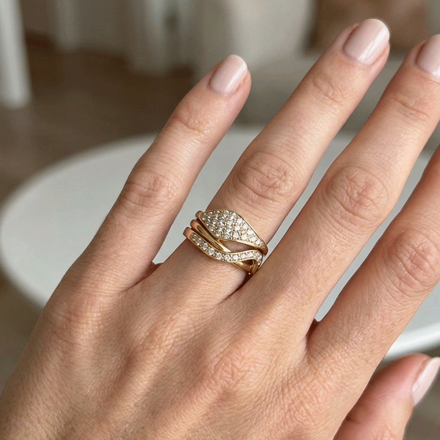 14-karat gold and diamond snake-shaped ring