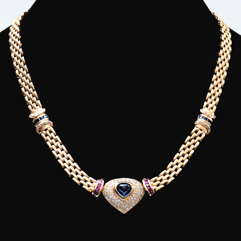 Gargantilla de Oro con centro de zafiro, Brillantes y rubíes