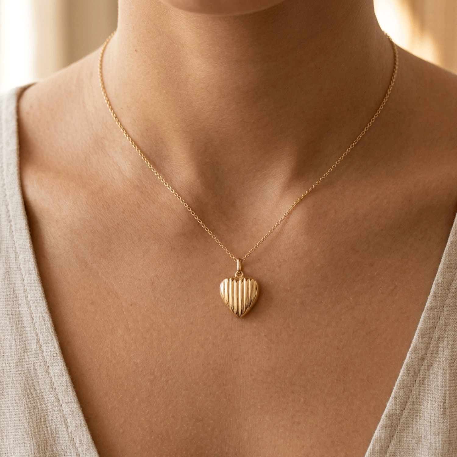 Dije Forma de Corazón en Oro 18k