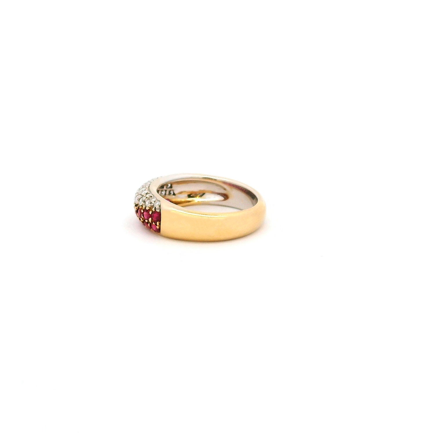 Anillo de Oro amarillo y Oro Blanco con 0.47ct Brillantes y 0.57ct Rubíes