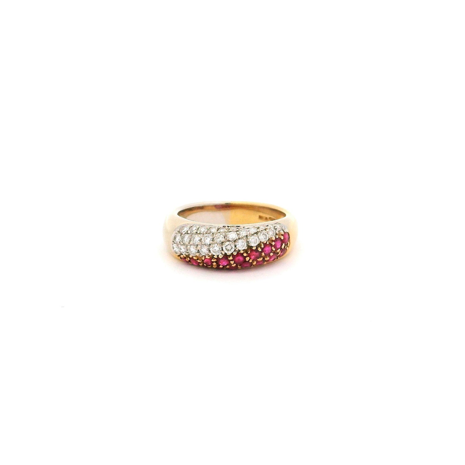 Anillo de Oro amarillo y Oro Blanco con 0.47ct Brillantes y 0.57ct Rubíes