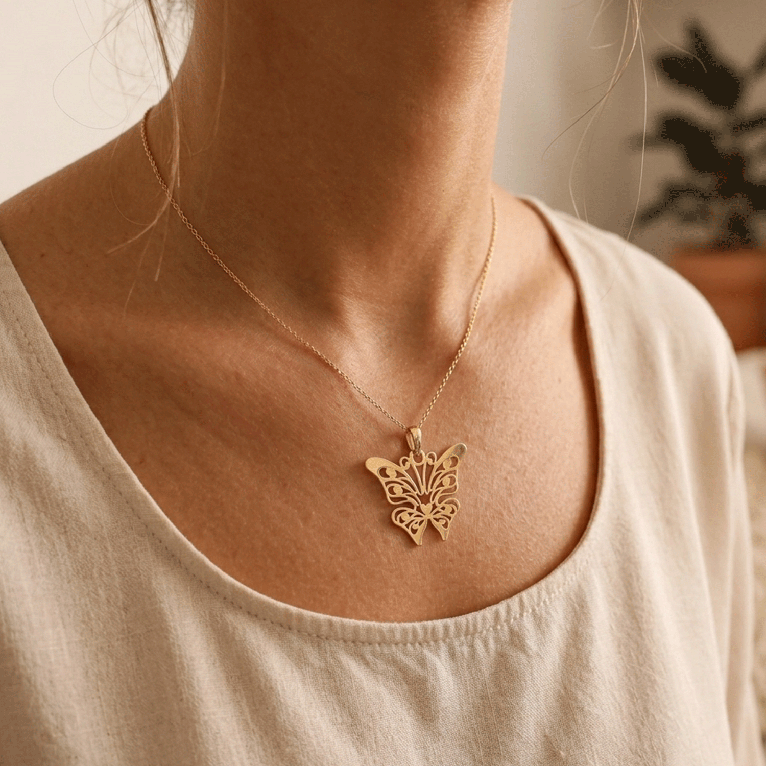 Dije Forma de Mariposa en Oro 18k