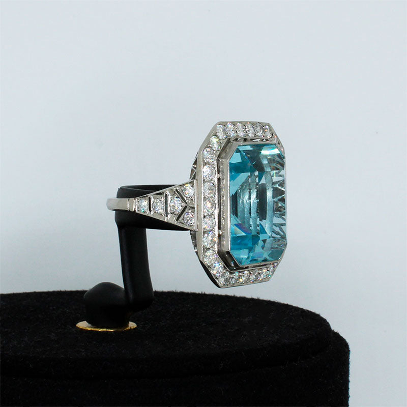 Platinum Ring with 22.49ct Aquamarine surrounded by Diamonds