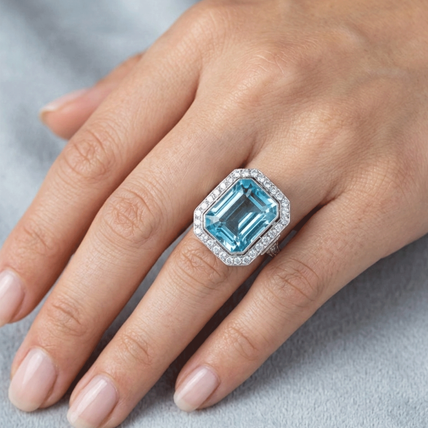 Platinum Ring with 22.49ct Aquamarine surrounded by Diamonds