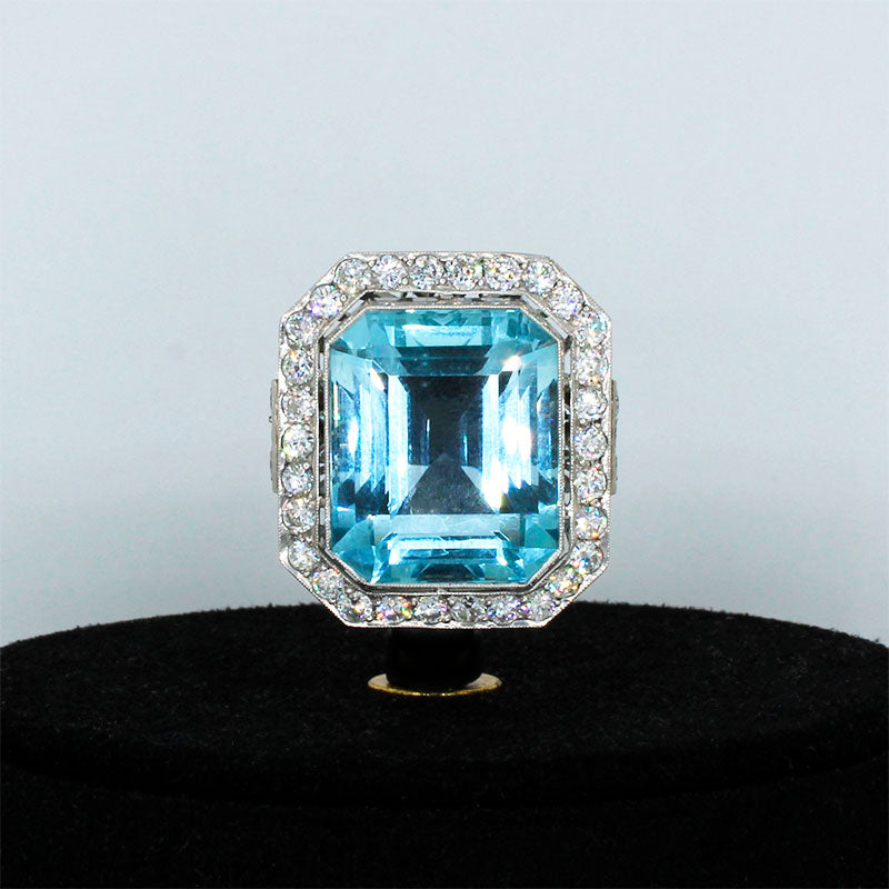 Platinum Ring with 22.49ct Aquamarine surrounded by Diamonds