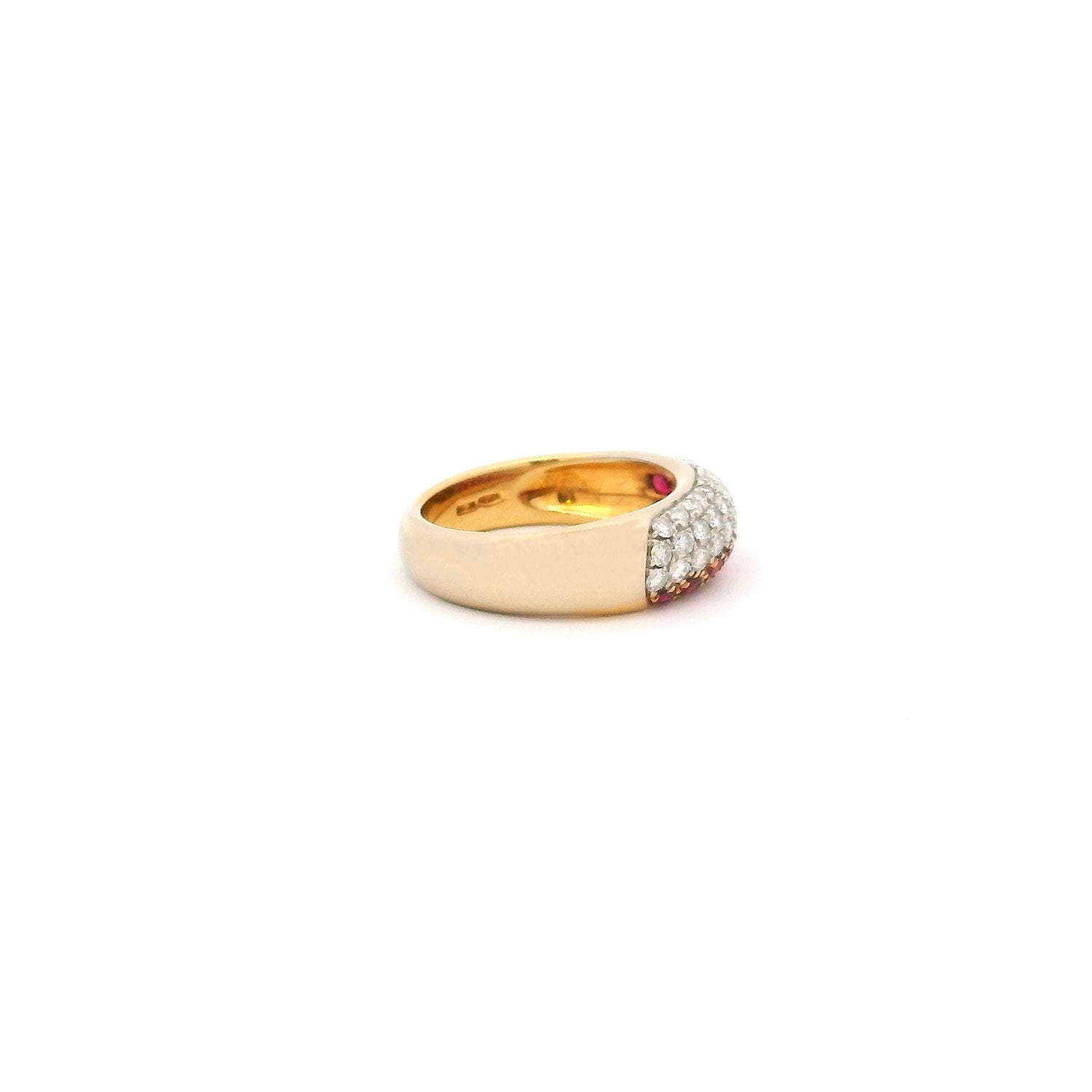 Anillo de Oro amarillo y Oro Blanco con 0.47ct Brillantes y 0.57ct Rubíes