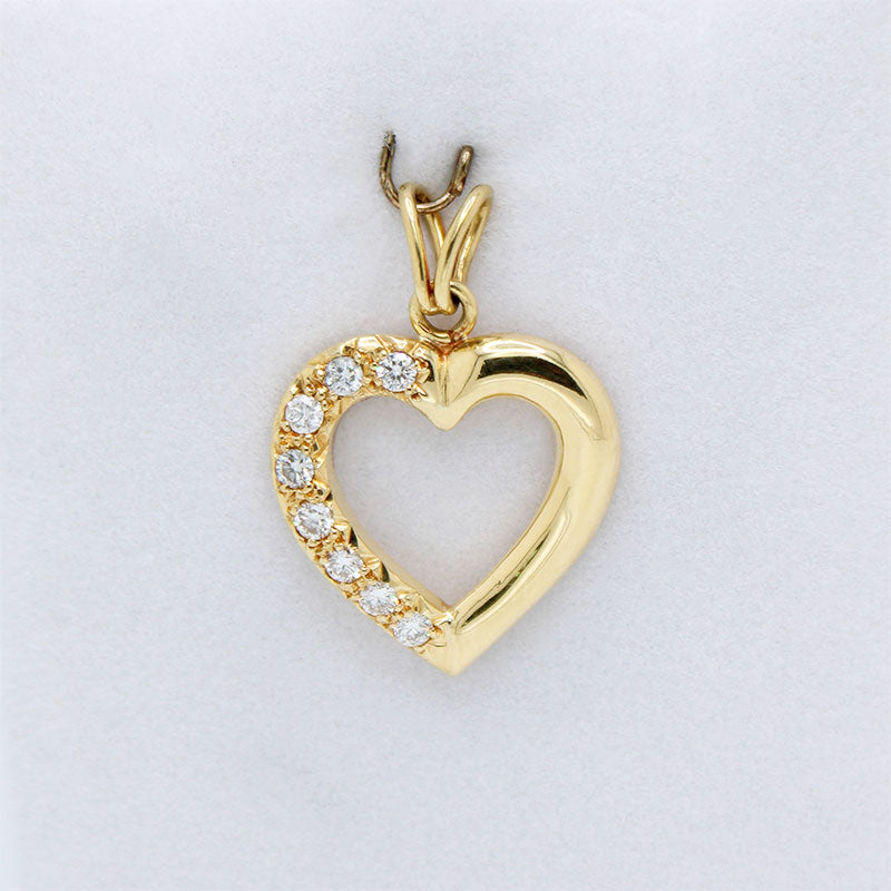 Dije Forma de Corazón en Oro 18k y Brillantes