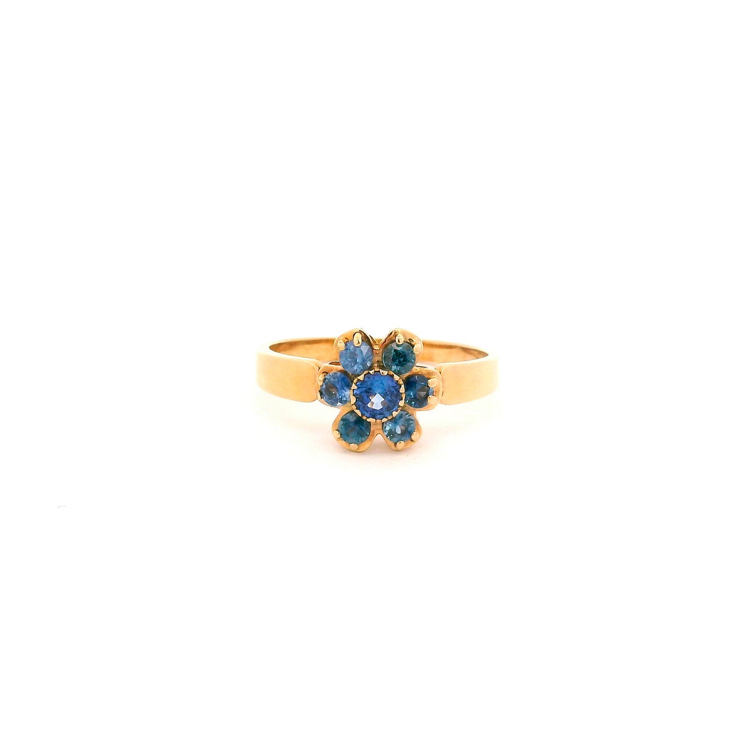 Anillo de Oro con Piedras Azules en Forma de Flor