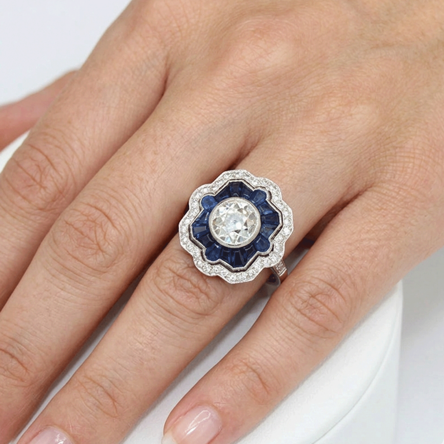 Art Deco Ring in Platinum with Natural Sapphires and 0.75ct Brilliant